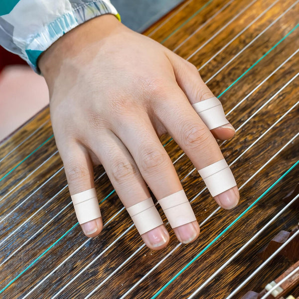 2-Roll Finger Tape - 0.6In x 32ft White Extra Strong Athletic Tape for Fingers, Hands,Feet,Toes - Sweat Resistant Protective Finger Tapes for Sports Climbing Football Volleyball & Basketball Unique